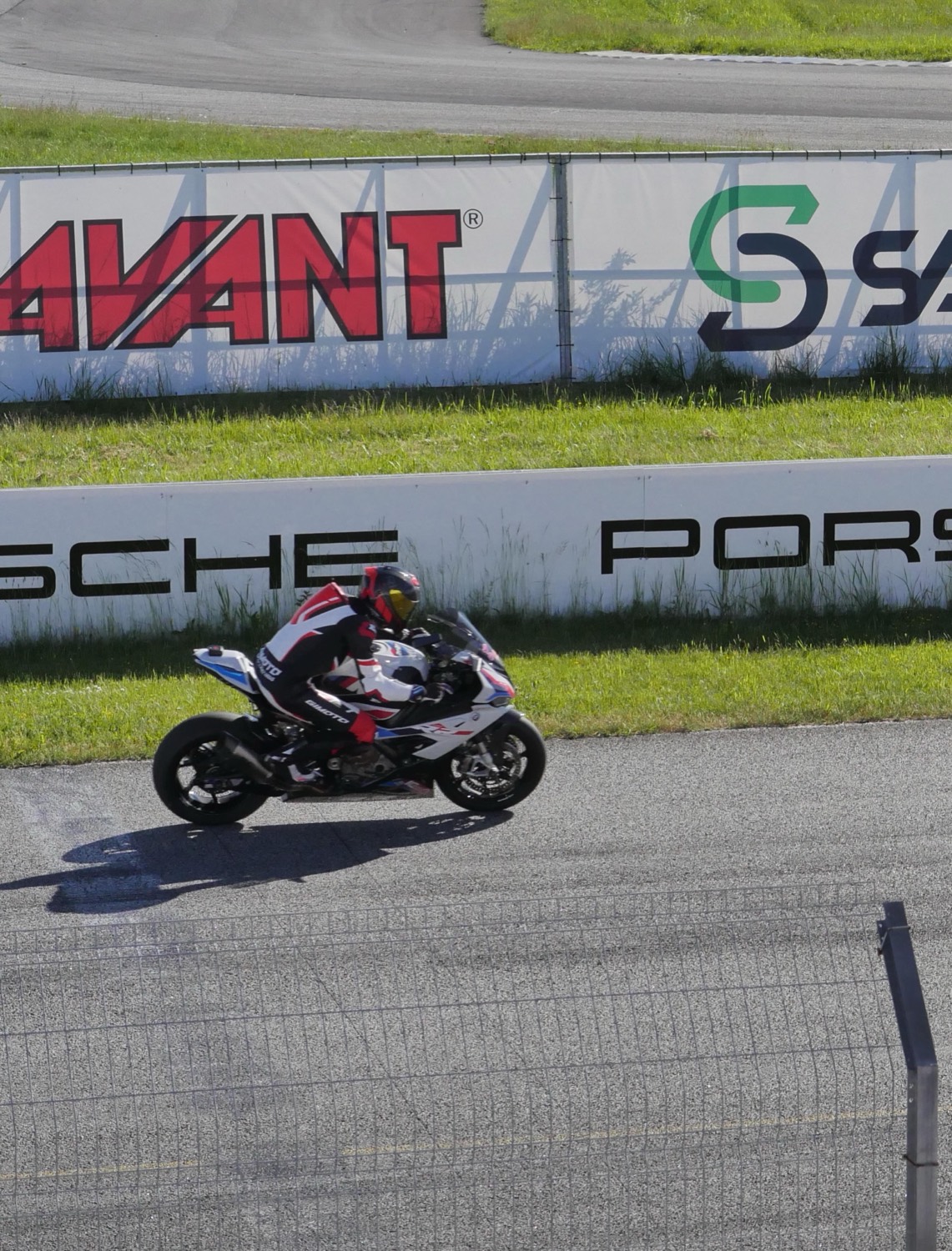 S 1000 RR on the main straight past advertising boards