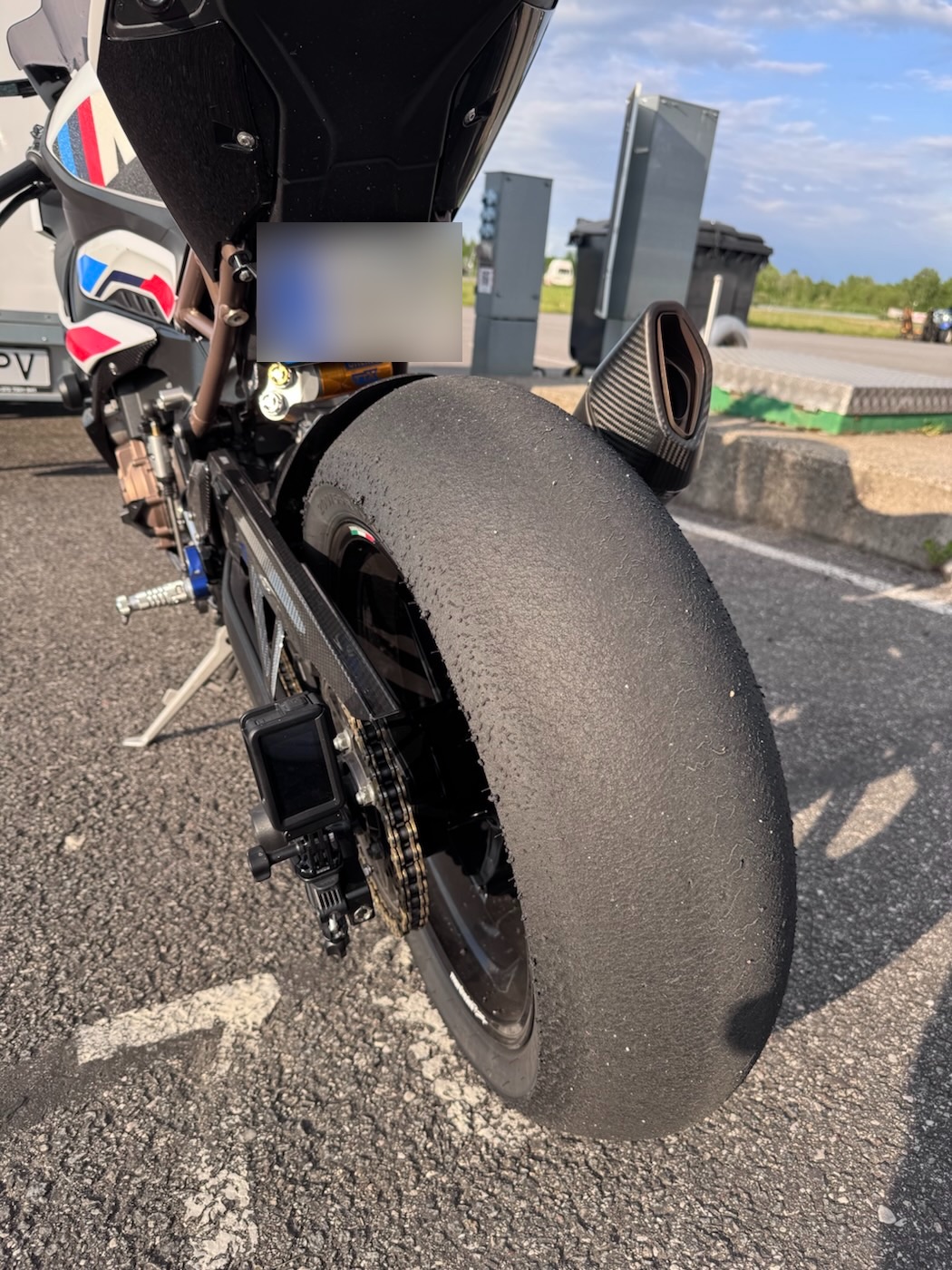 Rear slick after a session, shot in the paddock car park